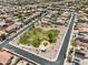 Gathering-friendly neighborhood featuring a community park and well-manicured homes at 22926 W Yavapai St, Buckeye, AZ 85326