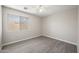 Neutral bedroom featuring hard wood floors and natural light from the window at 22926 W Yavapai St, Buckeye, AZ 85326