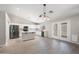 Modern kitchen featuring white cabinets, stainless steel appliances, and sleek countertops at 22926 W Yavapai St, Buckeye, AZ 85326