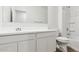 Bright bathroom with a single sink vanity, toilet, and a tub/shower combo at 25235 N 183Rd Dr, Wittmann, AZ 85361