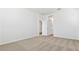 Bedroom features neutral colored carpet, baseboards, and an open doorway at 25235 N 183Rd Dr, Wittmann, AZ 85361
