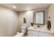Clean, minimalist bathroom with modern fixtures, a white vanity, and ample lighting at 25555 N Windy Walk Dr # 64, Scottsdale, AZ 85255