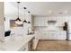 Bright kitchen with white countertops, stainless steel appliances, and sleek white cabinets at 25555 N Windy Walk Dr # 64, Scottsdale, AZ 85255