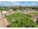 Flat, green lot situated in a residential neighborhood with mature trees offering great opportunity at 26232 S Lemon Ave, Queen Creek, AZ 85142