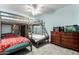 Bedroom with bunk bed, dresser, and ceiling fan at 26232 S Lemon Ave, Queen Creek, AZ 85142