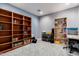 Bedroom with a wooden bookcase, shelving, and ample storage space at 26232 S Lemon Ave, Queen Creek, AZ 85142