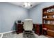 Bedroom with a desk, chair, bookshelf and modern lighting at 26232 S Lemon Ave, Queen Creek, AZ 85142