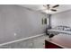 Bright bedroom featuring a daybed, soft carpet and ceiling fan at 26232 S Lemon Ave, Queen Creek, AZ 85142