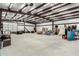 The interior of a metal storage shed featuring an open layout and lighting at 26232 S Lemon Ave, Queen Creek, AZ 85142
