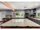 Bright kitchen with stylish cabinetry, expansive countertops, modern appliances, and an inviting atmosphere for cooking and entertaining at 26232 S Lemon Ave, Queen Creek, AZ 85142