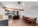 Open-concept kitchen with a large island, gray cabinetry, and modern stainless steel appliances at 26232 S Lemon Ave, Queen Creek, AZ 85142