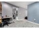 Spacious living room featuring plush carpeting and neutral gray walls at 26232 S Lemon Ave, Queen Creek, AZ 85142