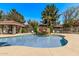 Inviting community pool with lush surroundings, rock waterfall, and gazebo seating at 2929 W Yorkshire Dr # 2074, Phoenix, AZ 85027