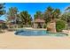 Resort-style community pool with a waterfall feature, gazebo and lush landscaping at 2929 W Yorkshire Dr # 2074, Phoenix, AZ 85027