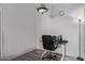 Bright home office featuring a modern desk, rolling chair, and overhead light fixture at 2929 W Yorkshire Dr # 2074, Phoenix, AZ 85027