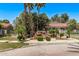 Beautiful water feature in the front of the building with mature trees and lush landscaping at 2929 W Yorkshire Dr # 2074, Phoenix, AZ 85027