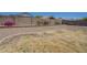 Backyard featuring desert landscaping, block wall and bordering residences at 3018 W Horsham Dr, Phoenix, AZ 85027