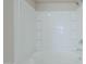 Bathroom showcasing a white tub and shower combination with tiled walls at 3018 W Horsham Dr, Phoenix, AZ 85027