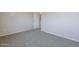 Bedroom features neutral walls, plush carpet, and an open doorway at 3018 W Horsham Dr, Phoenix, AZ 85027