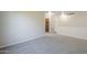 Bright bonus room featuring neutral walls and carpet flooring at 3018 W Horsham Dr, Phoenix, AZ 85027