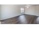 Bright living room with large window and neutral paint at 3018 W Horsham Dr, Phoenix, AZ 85027