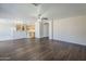 Open-concept living area with modern flooring adjacent to kitchen at 3018 W Horsham Dr, Phoenix, AZ 85027