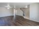 Open living area with staircase, features modern flooring at 3018 W Horsham Dr, Phoenix, AZ 85027