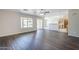 Open-concept living area with modern flooring adjacent to kitchen at 3018 W Horsham Dr, Phoenix, AZ 85027