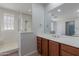 Bathroom features a walk-in shower and a sink at 30277 N 125Th Ln, Peoria, AZ 85383