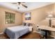 Bright bedroom with a single bed, desk area, and natural light, providing a cozy, functional space at 3031 E Avalon Dr, Phoenix, AZ 85016