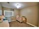 Cozy bedroom with a crib, window seat, and neutral tones, perfect for a Bedroom or room at 31256 N 40Th Pl, Cave Creek, AZ 85331