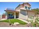 Charming two-story home featuring desert landscaping, a two car garage, and solar panels at 31256 N 40Th Pl, Cave Creek, AZ 85331