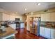 Bright kitchen with stainless steel appliances, granite countertops, and sleek white cabinetry at 31256 N 40Th Pl, Cave Creek, AZ 85331