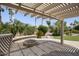 Outdoor patio with built-in seating and fire pit at 3394 N 147Th Ln, Goodyear, AZ 85395