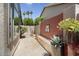 A cozy courtyard featuring desert landscaping and decorative potted plants at 3394 N 147Th Ln, Goodyear, AZ 85395
