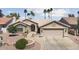 Charming single-story home featuring a desert-landscaped yard and attached two-car garage at 3394 N 147Th Ln, Goodyear, AZ 85395