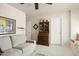 Comfortable living area with a couch, decorative furniture, and natural light at 3394 N 147Th Ln, Goodyear, AZ 85395