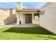Backyard featuring artifical grass and covered patio at 3440 E Southern Ave # 1107, Mesa, AZ 85204