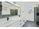 Modern bathroom with a double sink vanity and a walk-in shower at 3440 E Southern Ave # 1107, Mesa, AZ 85204