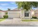 Charming single-story home boasting a two-car garage, desert landscaping, and a welcoming facade at 3440 E Southern Ave # 1107, Mesa, AZ 85204