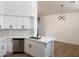 Bright kitchen featuring quartz counters, stainless steel appliances and a view of the dining area at 3440 E Southern Ave # 1107, Mesa, AZ 85204