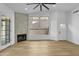 Bright living room with a fireplace, ceiling fan and lots of natural light at 3440 E Southern Ave # 1107, Mesa, AZ 85204