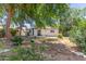 Backyard features mature trees and a secure block fence for privacy at 3526 E Cheery Lynn Rd, Phoenix, AZ 85018