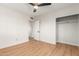 Spacious bedroom with laminate floors and ceiling fan at 3526 E Cheery Lynn Rd, Phoenix, AZ 85018