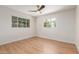 Bedroom with laminate floors, ample windows and ceiling fan at 3526 E Cheery Lynn Rd, Phoenix, AZ 85018