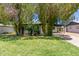Charming home with green lawn and mature trees offering shade and curb appeal at 3526 E Cheery Lynn Rd, Phoenix, AZ 85018