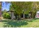 White home with mature landscaping, shrubs, and healthy green lawn at 3526 E Cheery Lynn Rd, Phoenix, AZ 85018
