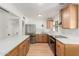 Updated kitchen with new stainless steel appliances and quartz countertops at 3526 E Cheery Lynn Rd, Phoenix, AZ 85018