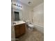 Full bathroom featuring a shower-tub combo and modern fixtures at 43213 W Cowpath Rd, Maricopa, AZ 85138