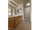 Bathroom vanity featuring double sinks and mirrors, ready for customization at 43213 W Cowpath Rd, Maricopa, AZ 85138